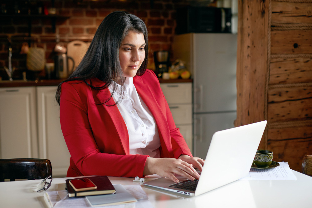 Employee talking on laptop